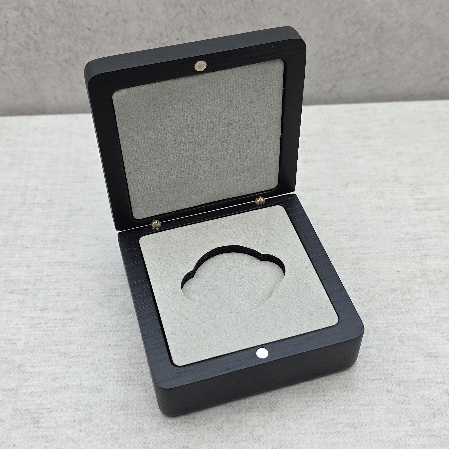 Open black ash wood coin box with premium light gray velvet insert and double side notches, luxury challenge coin display case.