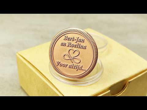 Video demonstration of a custom engraved copper gift coin, showcasing the 32mm diameter, reflective copper surface, and precision etching.
